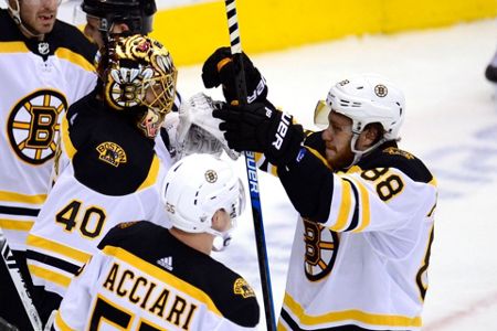 Marchand helps Bruins beat Maple Leafs 4-2 to force Game 7