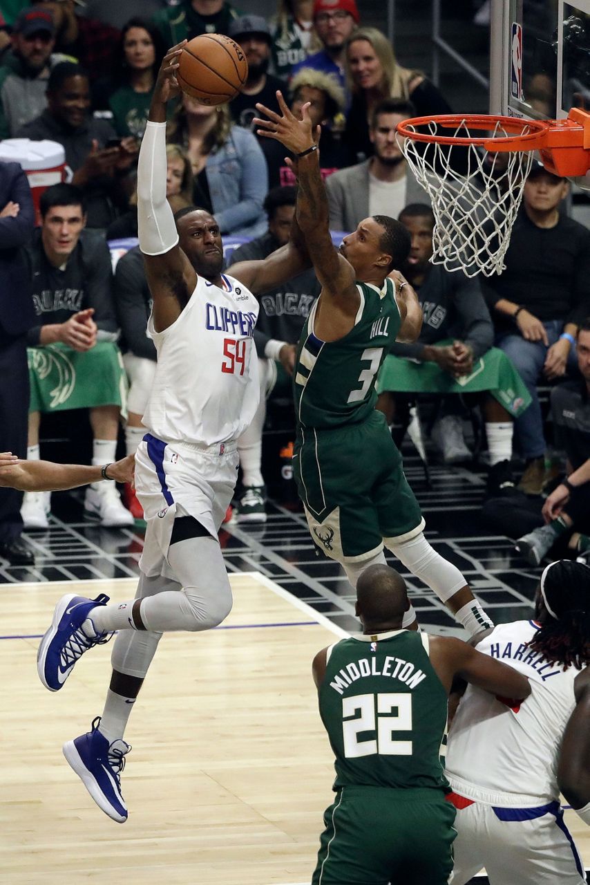 Bucks hold off Clippers 129-124 for 4th win in a row
