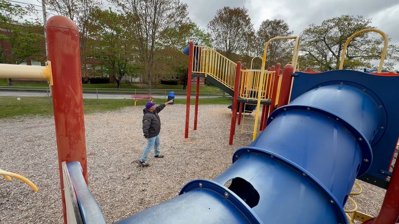 Bucksport Community and Economic Development Director Richard Rotella points out a missing slide. (Spectrum News/David Ledford)