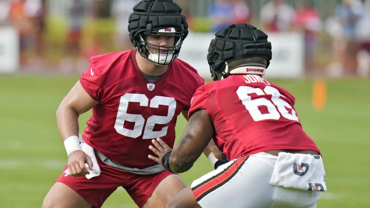 Bucs first-round draft pick Graham Barton (62) works against guard Avery Jones during training camp. Barton has been named Tampa Bay's starting center. (AP Photo/Christopher O'Meara)