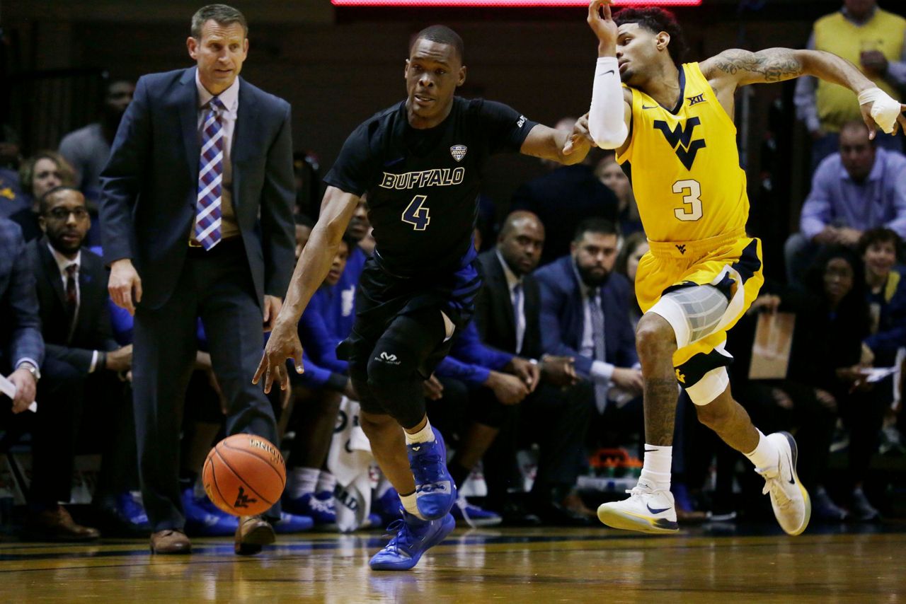 Massinburg scores 43, Buffalo stuns No. 13 WVU 9994 in OT