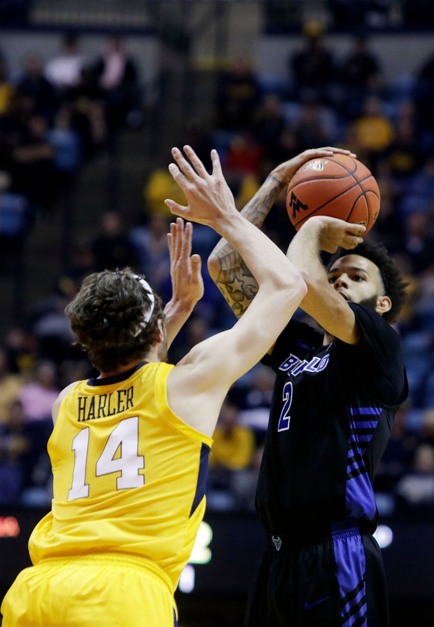 Massinburg scores 43, Buffalo stuns No. 13 WVU 9994 in OT