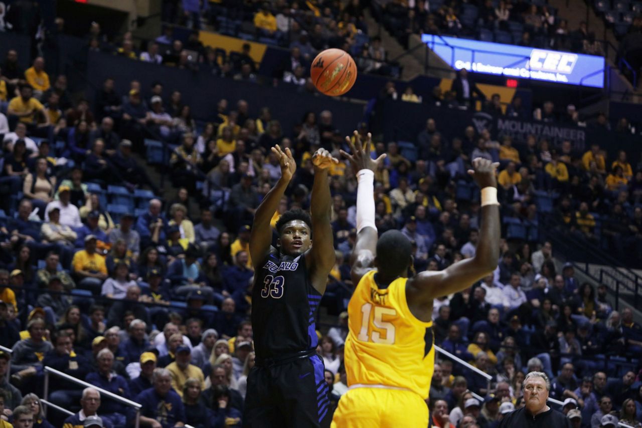 Massinburg scores 43, Buffalo stuns No. 13 WVU 9994 in OT