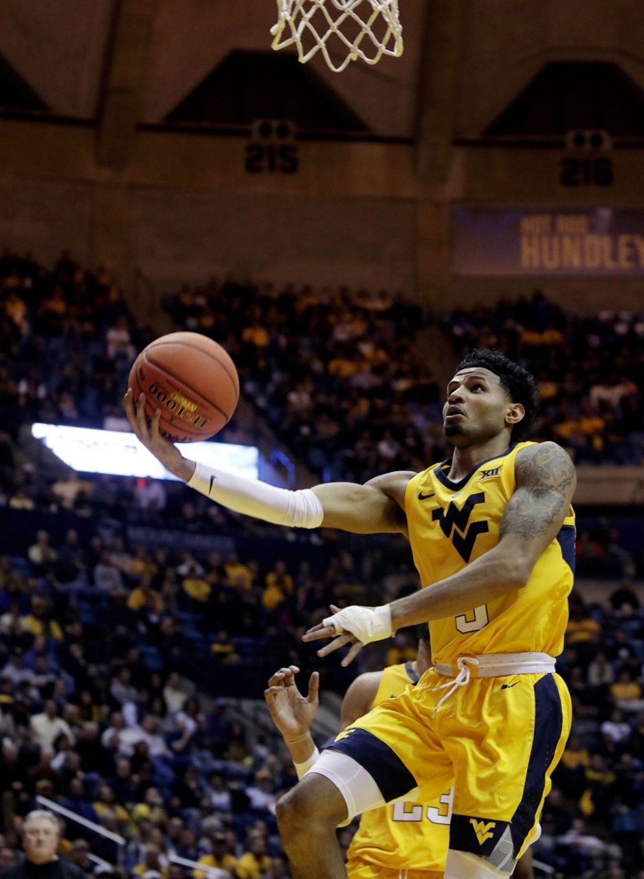 Massinburg scores 43, Buffalo stuns No. 13 WVU 9994 in OT