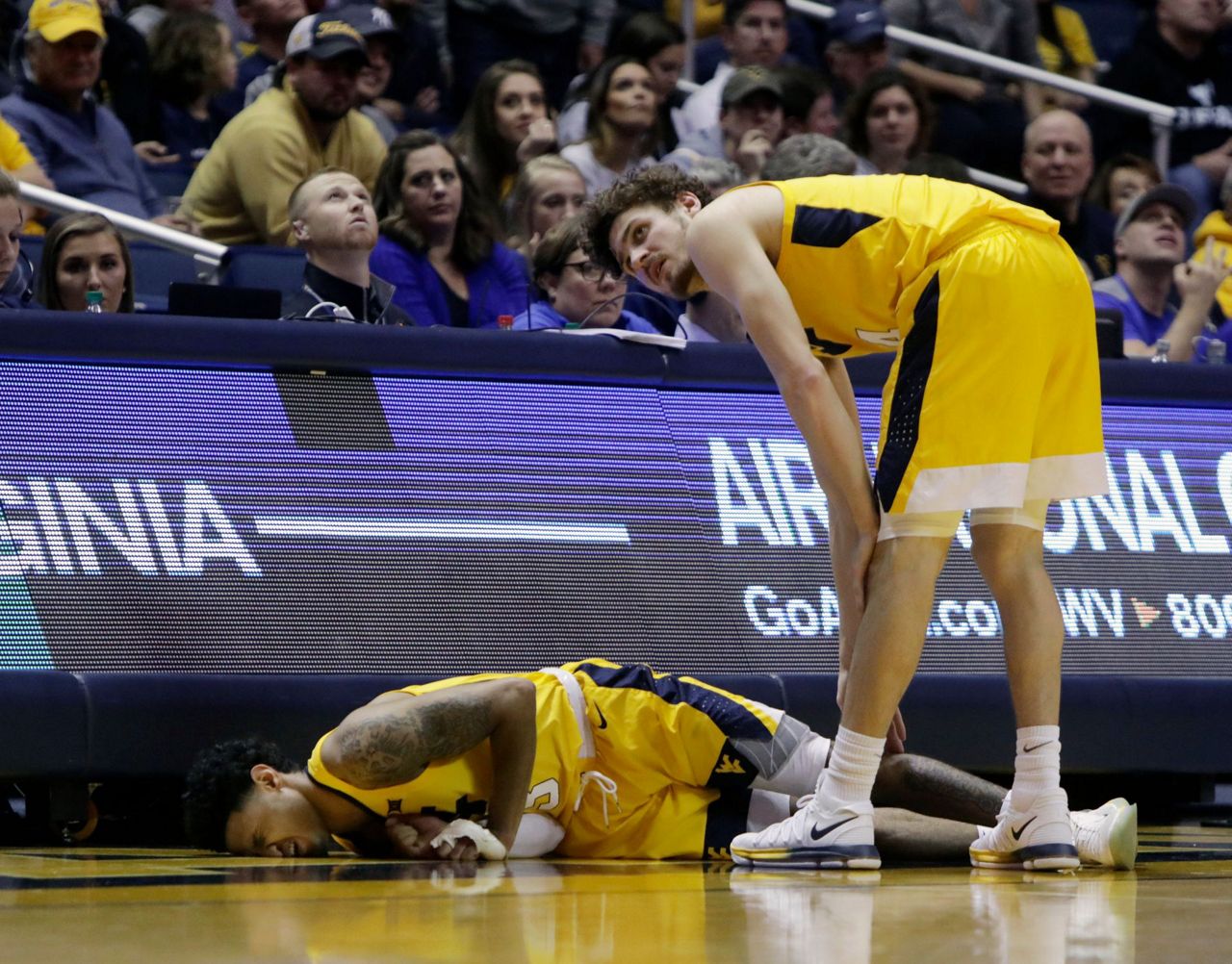 Massinburg scores 43, Buffalo stuns No. 13 WVU 9994 in OT