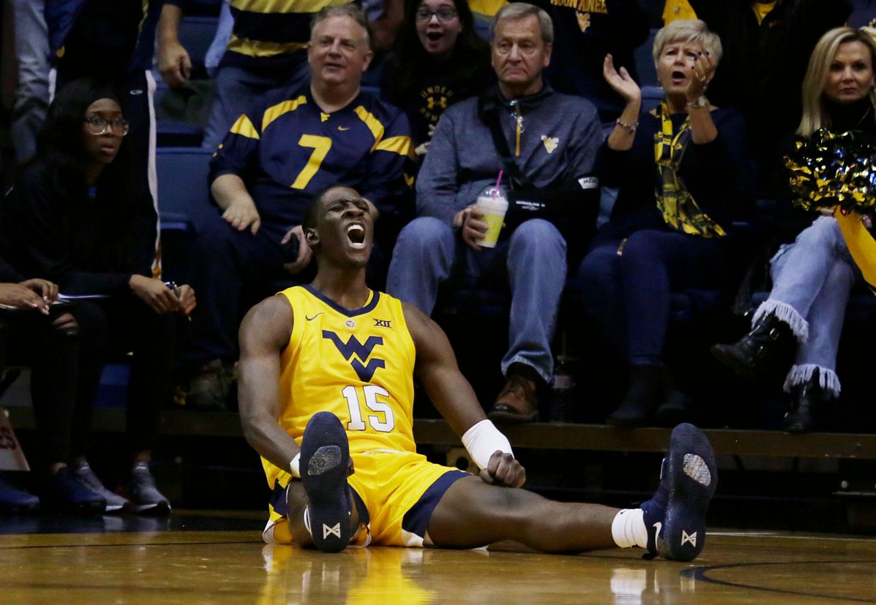 Massinburg scores 43, Buffalo stuns No. 13 WVU 9994 in OT