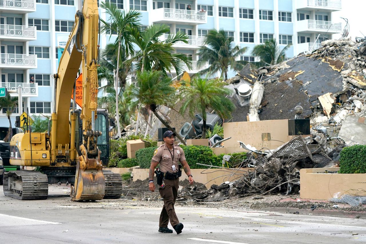 Tears, prayers mark end to search for Miami condo survivors