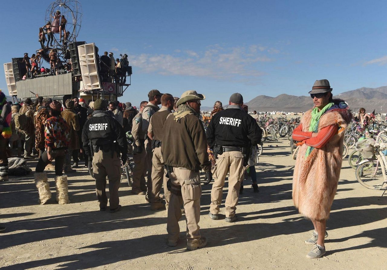 Burning man OK with attendance cap; will fight searches