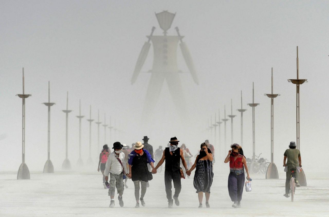 Burning man OK with attendance cap; will fight searches
