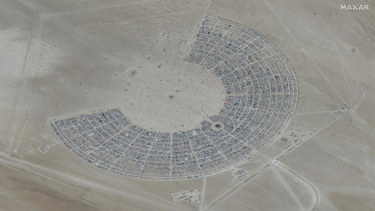 In this satellite photo provided by Maxar Technologies, an overview of Burning Man festival in Black Rock is seen on Monday, Aug. 28, 2023.