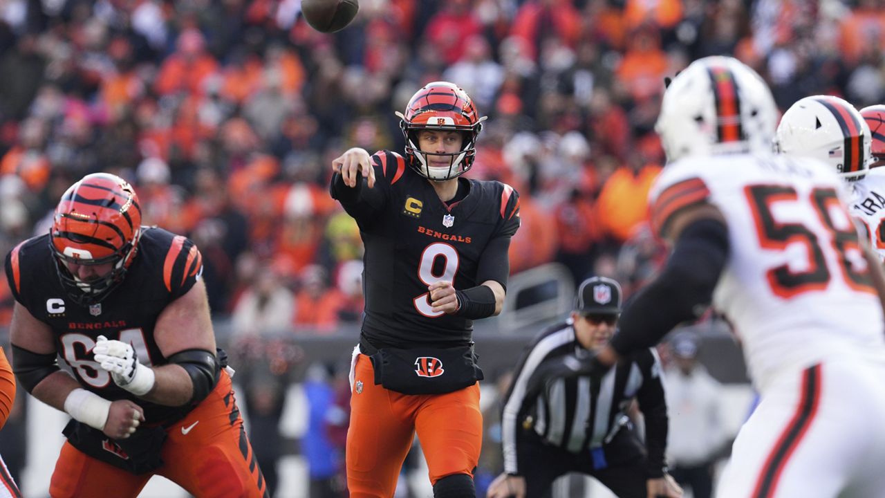 Cincinnati Bengals quarterback Joe Burrow (9) throws for a touchdown during the first half of an NFL football game against the Cleveland Browns, Sunday, Dec. 22, 2024, in Cincinnati. (AP Photo/Jeff Dean)