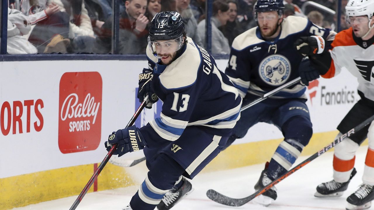 Columbus Blue Jackets left wing Johnny Gaudreau (13) controls the puck during the second period of the team's NHL hockey game against the Philadelphia Flyers, Saturday, April 6, 2024, in Columbus, Ohio. 