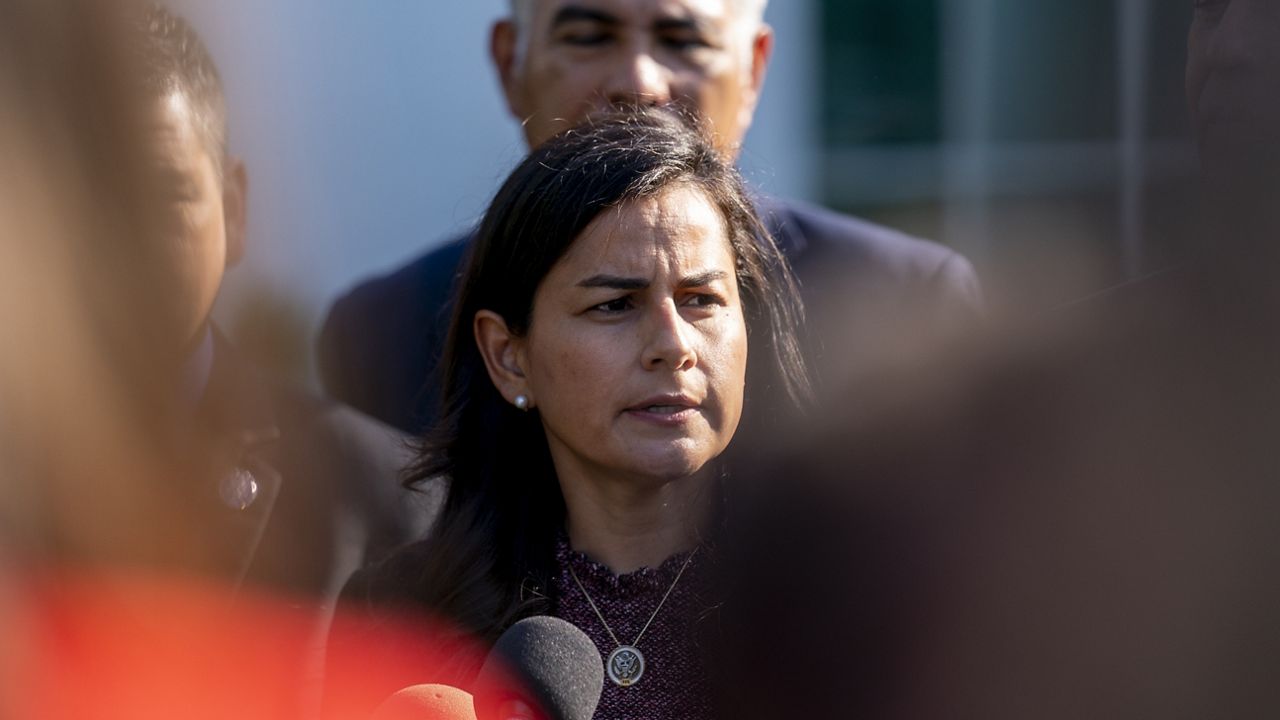 Rep. Nanette Barragan, D-Calif., center, accompanied by other members, speaks to members of the media following a meeting with President Joe Biden at the White House in Washington, Monday, April 25, 2022. (AP Photo/Andrew Harnik)