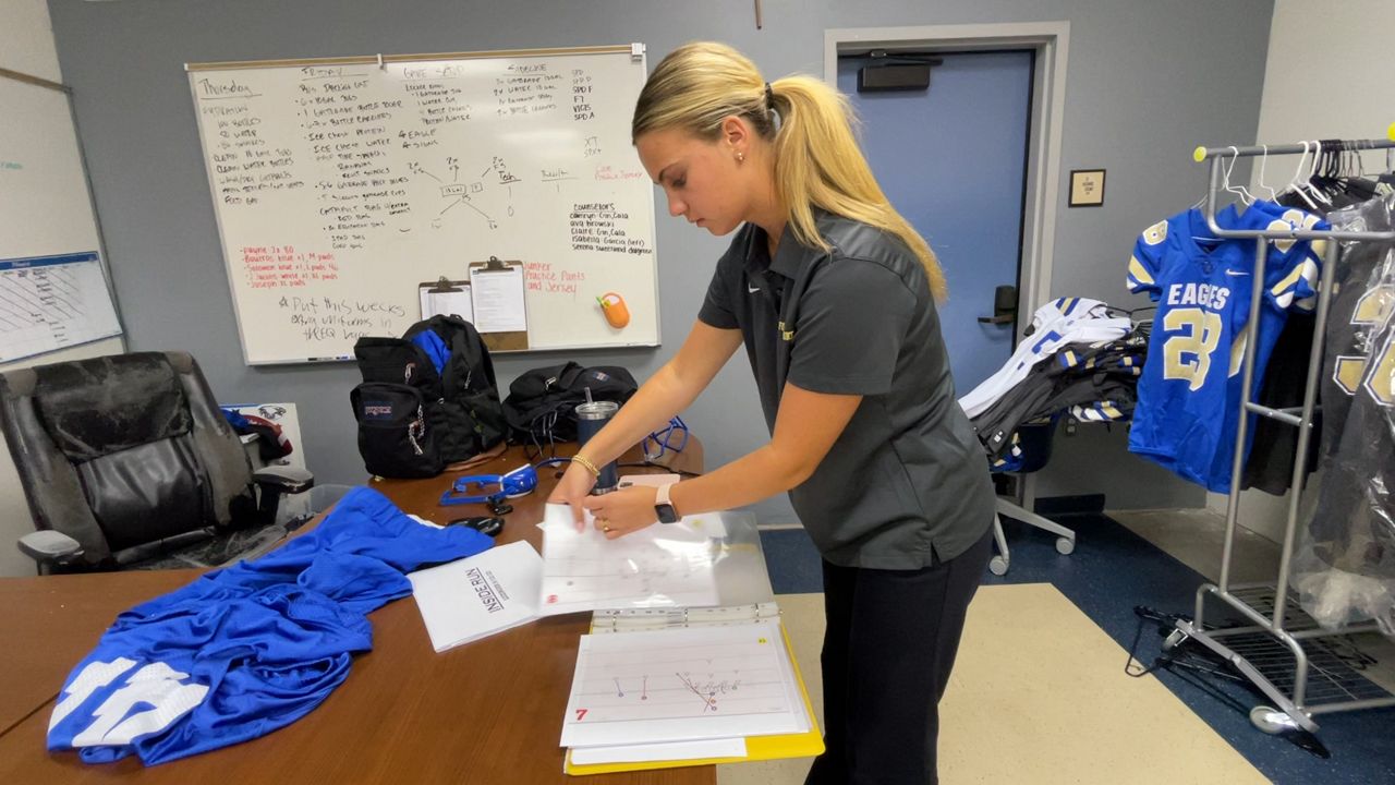 Senior Emily Regitz is a football coach intern at Santa Margarita Catholic High School (Spectrum News/ Nikki Kay)