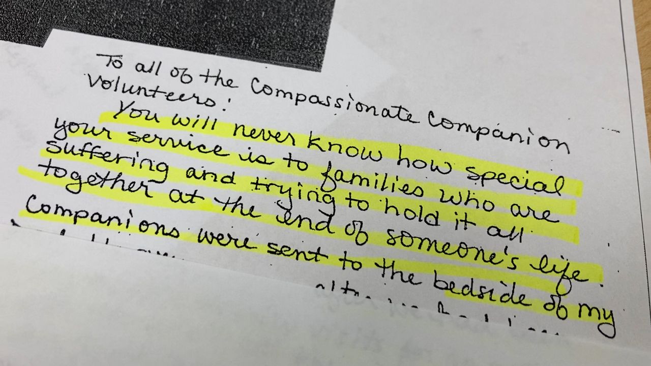 A letter expresses gratitude for the work of volunteers with the 'Compassionate Companions' program. (Spectrum News 1/Devin Bates)