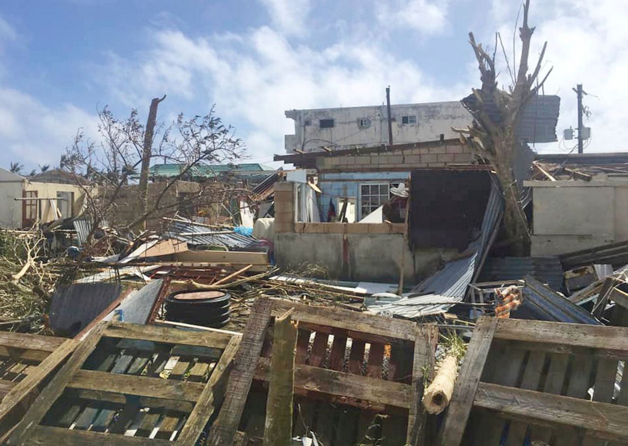 Resilient islanders brace for long recovery after typhoon