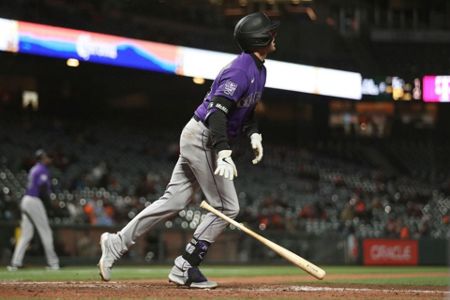 Rockies finally win on the road, beat Giants 7-5 in 10 - Sentinel