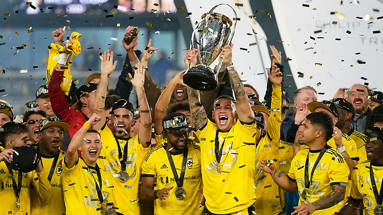 Columbus Crew players celebrate as Christian Ramírez holds up the trophy after defeating Los Angeles FC to win the MLS soccer championship match, Saturday, Dec. 9, 2023, in Columbus, Ohio. 