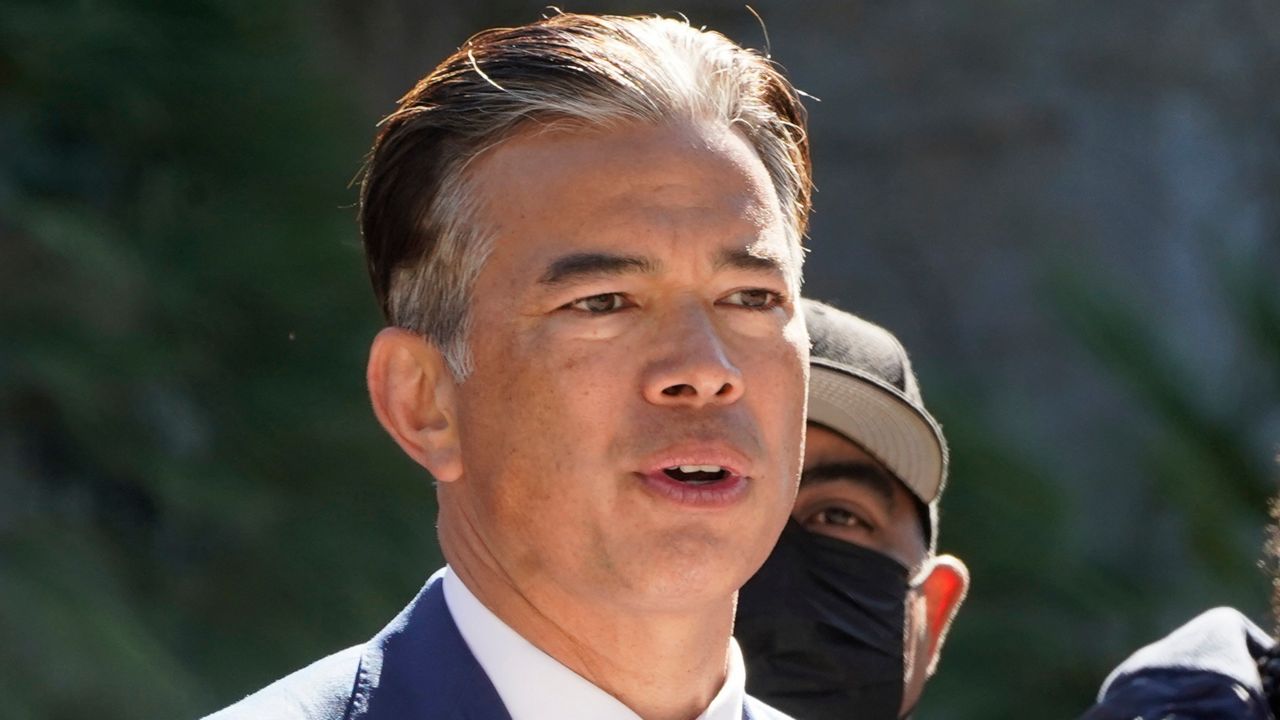 California Attorney General Rob Bonta speaks at a news conference at the Capitol in Sacramento, Calif., Feb. 23, 2022. California's attorney general says the state of Florida appears to have arranged for a group of South American migrants to be dropped off outside a Sacramento church. Bonta said Saturday, June 3, 2023 the individuals had documents purporting to be from the Florida state government. (AP Photo/Rich Pedroncelli, File)