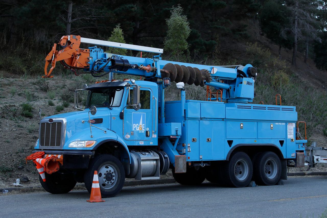 The Latest Power outages begin in California