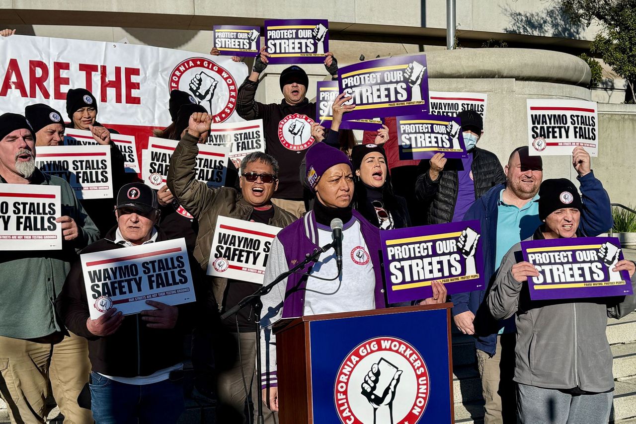 Lyft and Uber drivers protest Waymo robotaxis as California considers ...