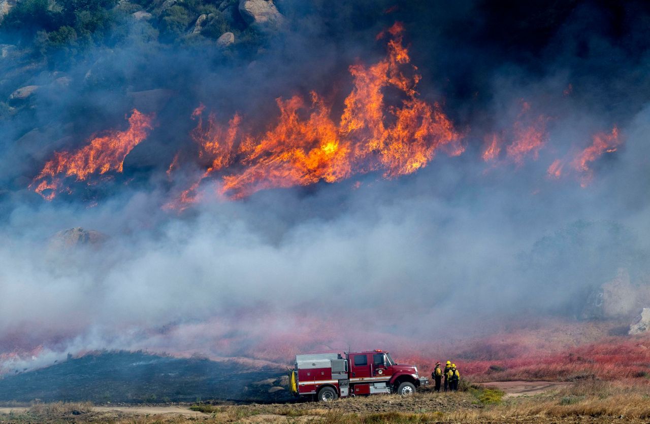 Crews battle fast-growing wildfire in windy Southern California that's ...