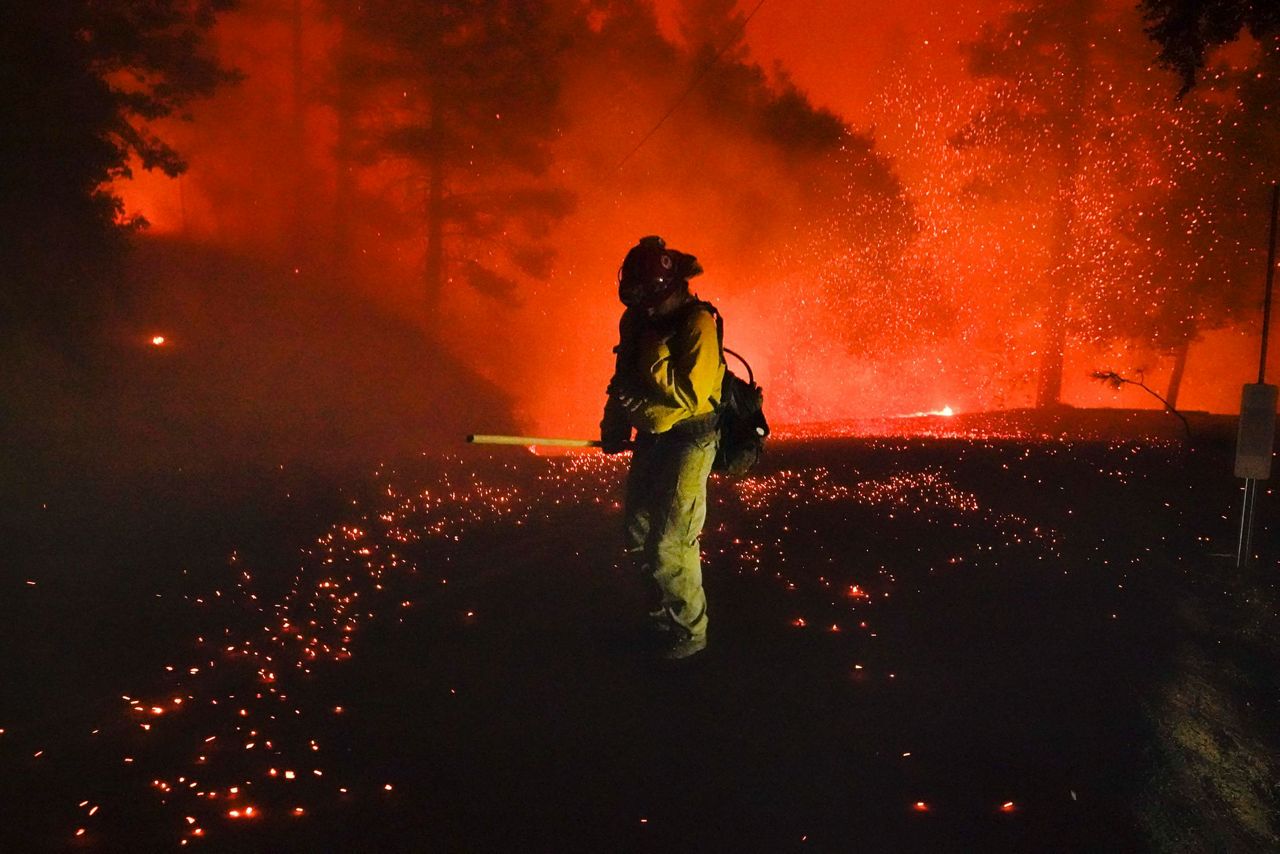 As California burns, the winds arrive and the lights go out