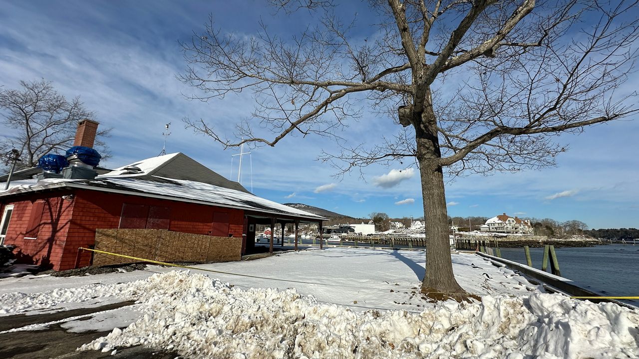 The Camden Yacht Club's seawall sustained significant damage during the coastal storms that battered many Maine communities earlier this month. (Spectrum News/Susan Cover)