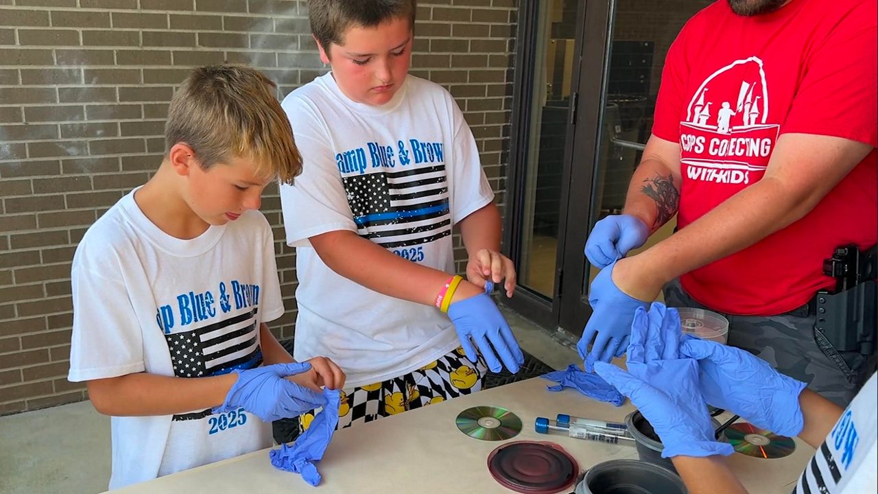 Henderson kids get hands-on with law enforcement at summer camp  