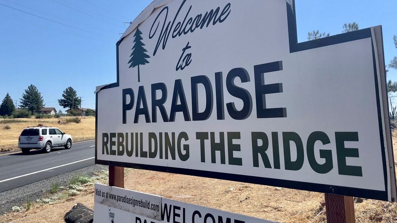 A sign welcomes motorists to Paradise, Calif., on Aug. 5, 2023. (AP Photo/Haven Daley)