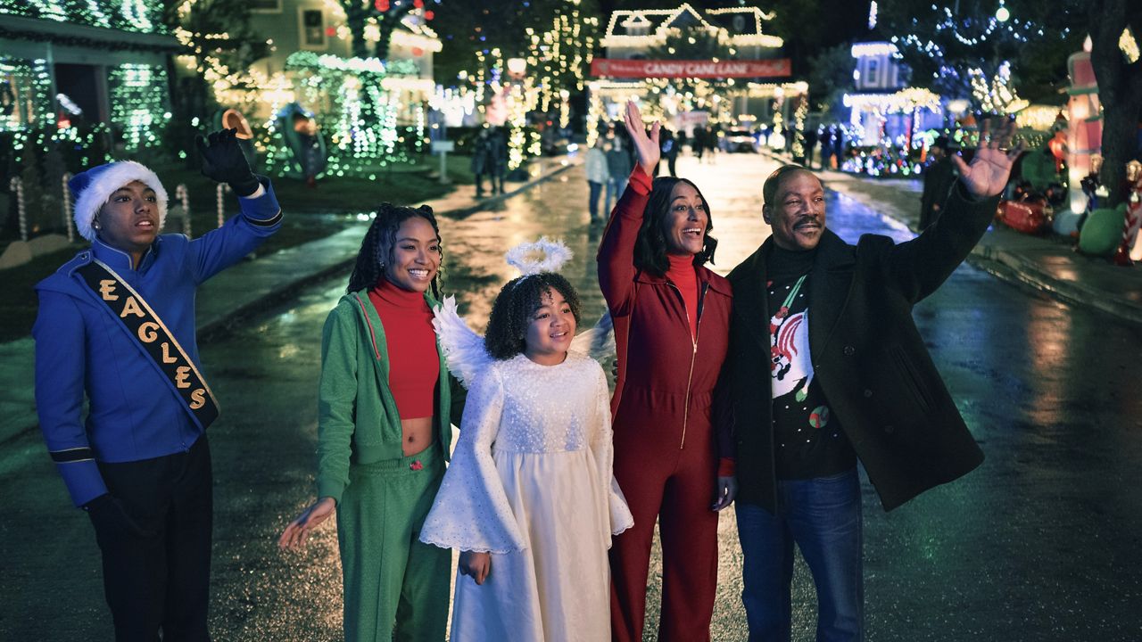 Thaddeus J. Mixson as Nick Carver, Genneya Walton as Joy Carver, Madison Thomas as Holly Carver, Tracee Ellis Ross as Carol Carver, and Eddie Murphy as Chris Carver star in 