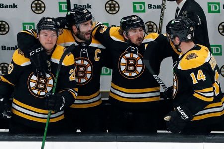 Bruins' Kevan Miller transported to hospital after second-period