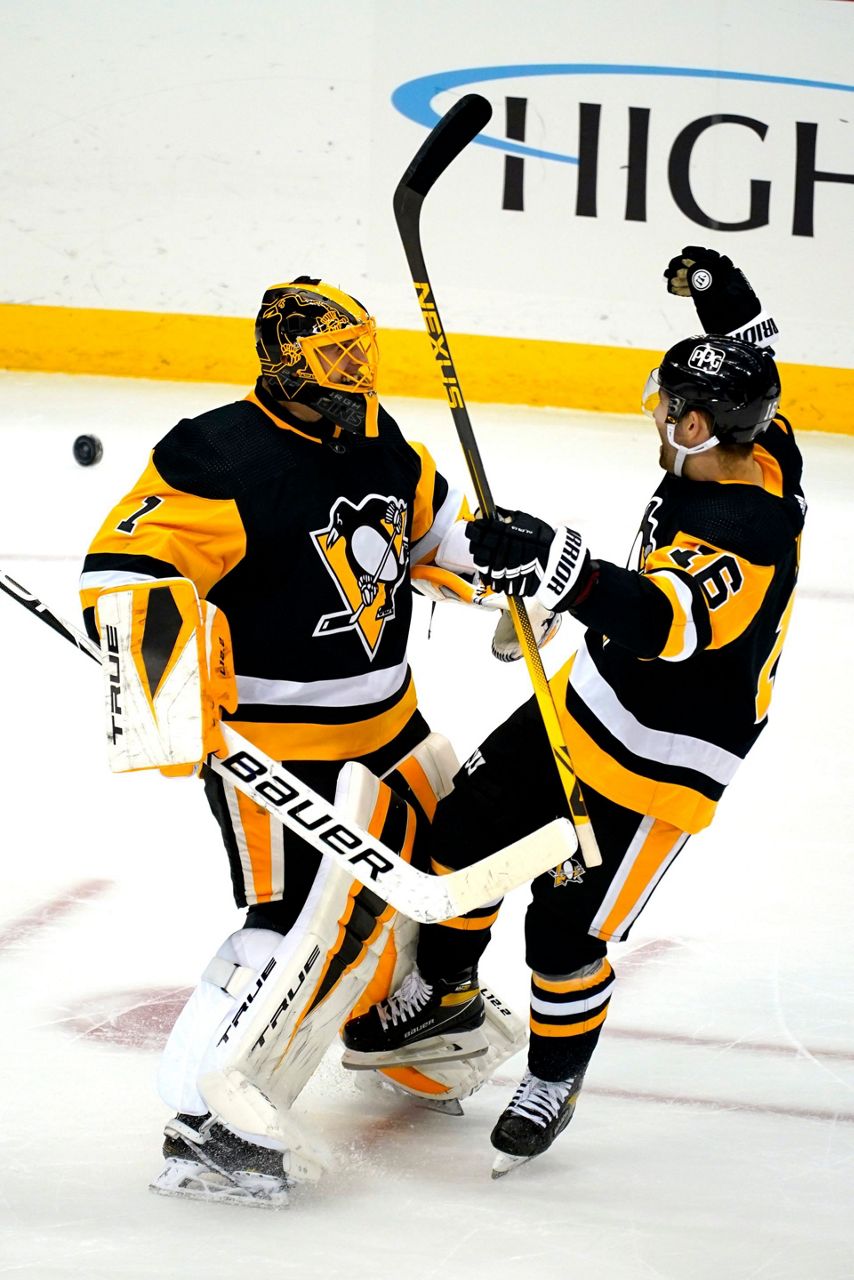 Pittsburgh Penguins' John Marino (6) plays against the Washington