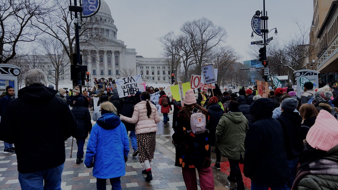 Hundreds of abortion rights protesters march on the Capitol