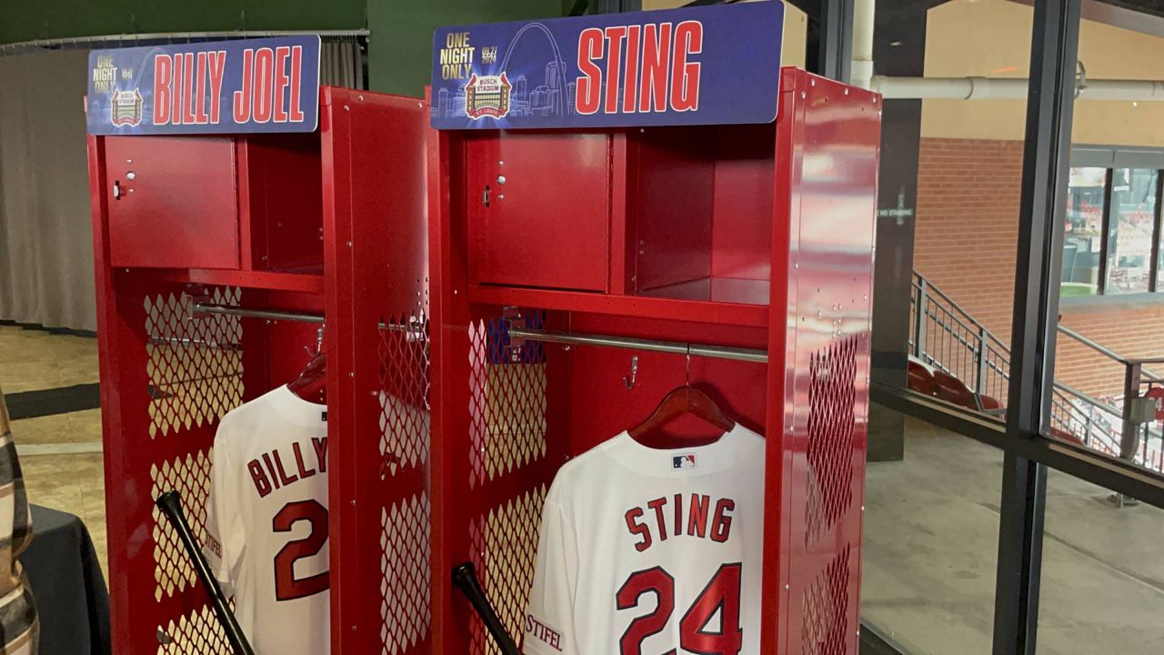 The St. Louis Cardinals staged a pair of lockers and jerseys to announce Billy Joel and Sting will perform live in concert at Busch Stadium in September. (Spectrum News/Gregg Palermo)