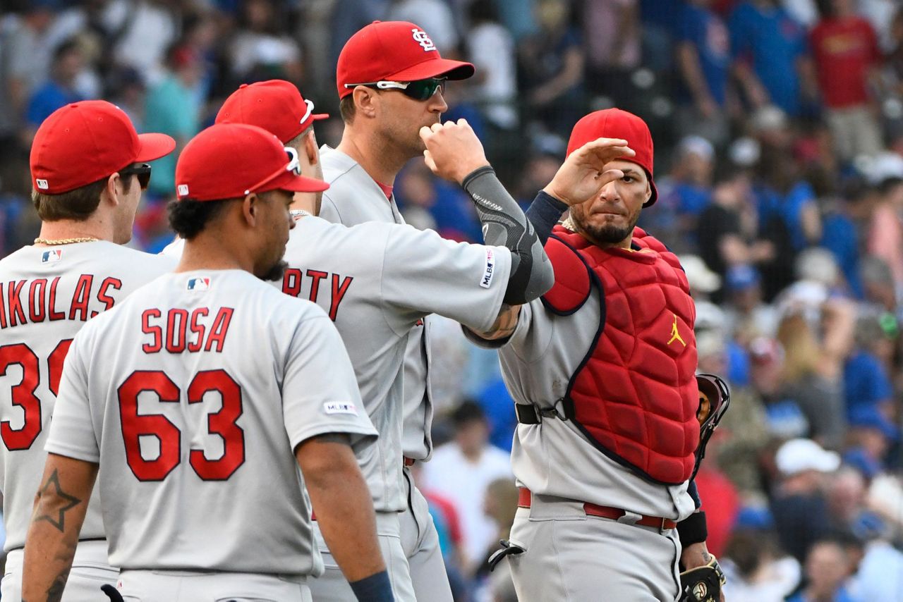 Molina, Cardinals hold off fading Cubs again, 2-1