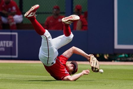 Pujols gets spring hit for Cards with wife in brain surgery –