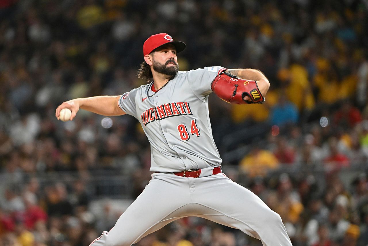 Cincinnati Reds relief pitcher Casey Kelly throws in the ninth inning of a baseball game against the Pittsburgh Pirates in Pittsburgh on Saturday, August 24, 2024.