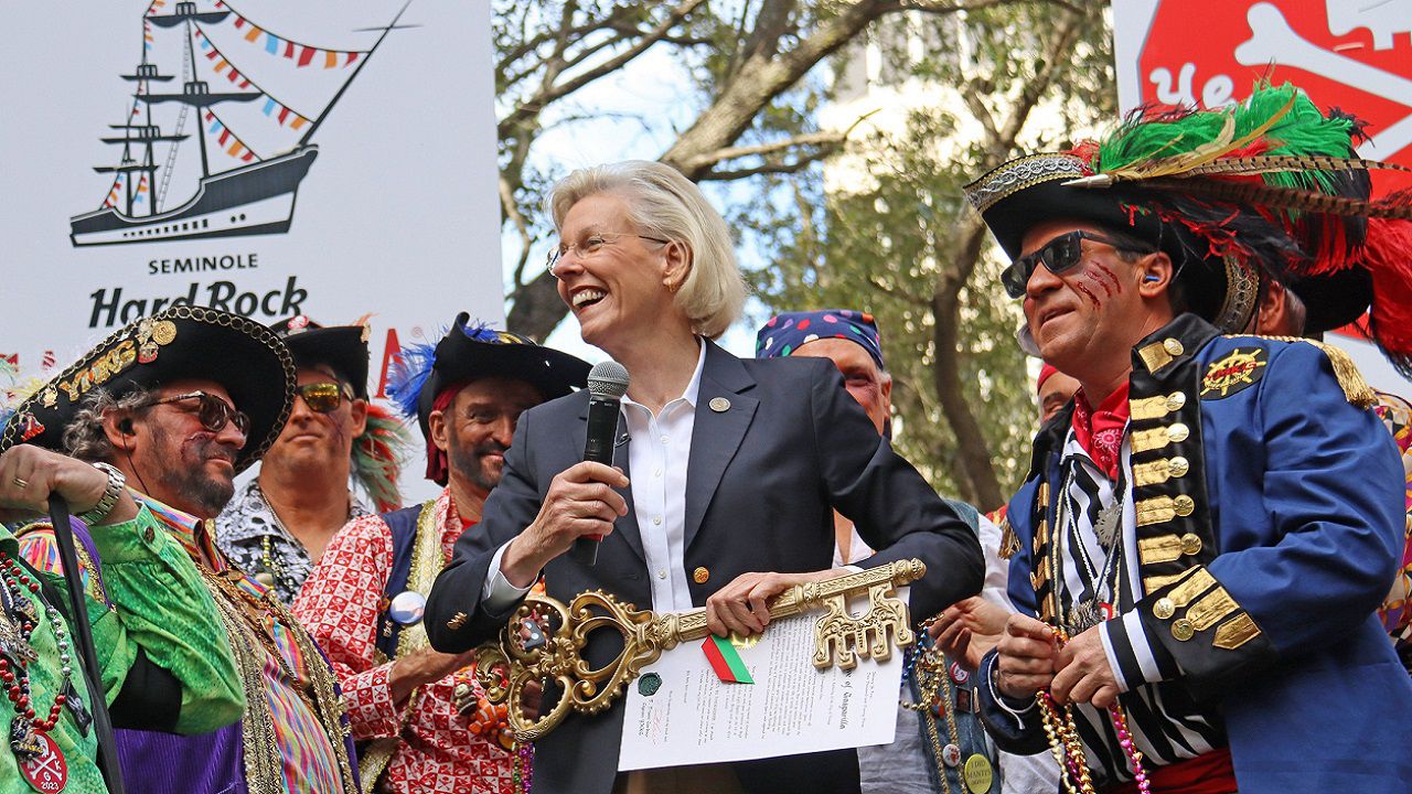 Mayor Jane Castor with the marauding pirates outside of Tampa's City Hall. They promised to invade on Saturday. (FILE IMAGE)