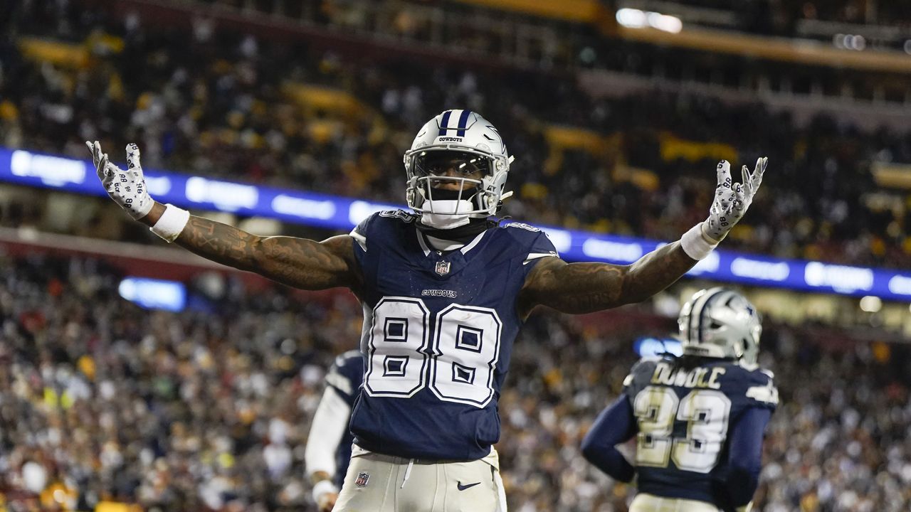 Dallas Cowboys wide receiver CeeDee Lamb (88) celebrating his touchdown against the Washington Commanders during the first half of an NFL football game, Sunday, Jan. 7, 2024, in Landover, Md. (AP Photo/Jessica Rapfogel)