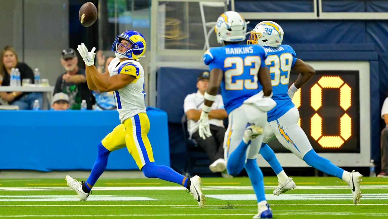 Los Angeles Rams wide receiver JJ Laap, left, makes a touchdown catch during the second half of a preseason NFL football game against the Los Angeles Chargers, Saturday, Aug. 17, 2024, in Inglewood, Calif. (AP Photo/Jayne Kamin-Oncea)