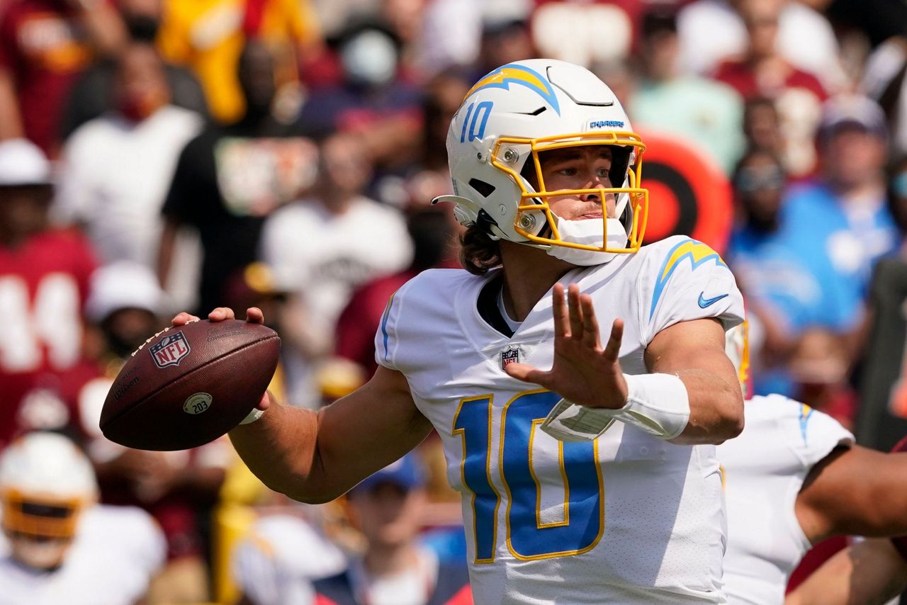 Washington Football Team quarterback Ryan Fitzpatrick (14) throws