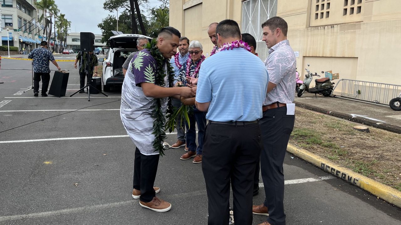 A blessing was held Monday at the site of a new electric vehicle charging station at Aloha Tower. (Hawaii Department of Transportation)