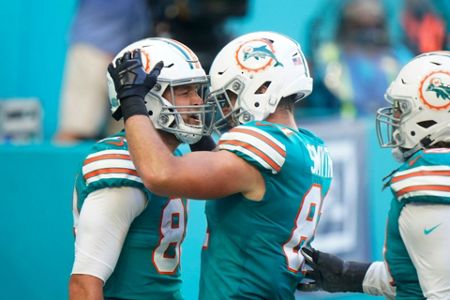 Miami Dolphins tight end Mike Gesicki (88) catches a touchdown pass, during  the second half of …