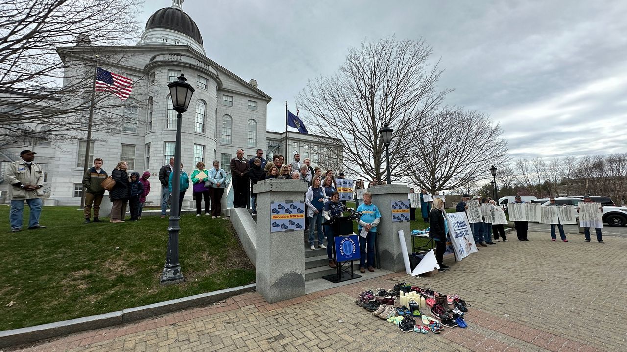 Child welfare advocates rallied at the State House Tuesday to continue to call for reforms. (Spectrum News/Susan Cover)