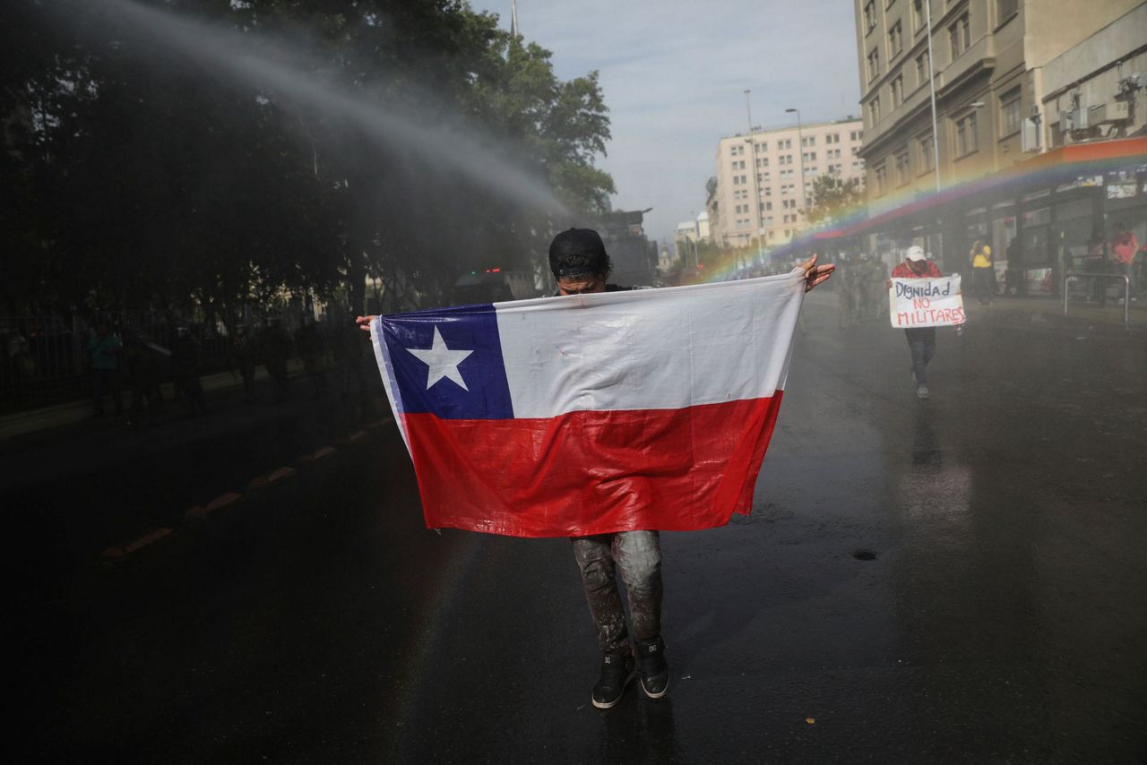Chilean president shaking up government amid protests