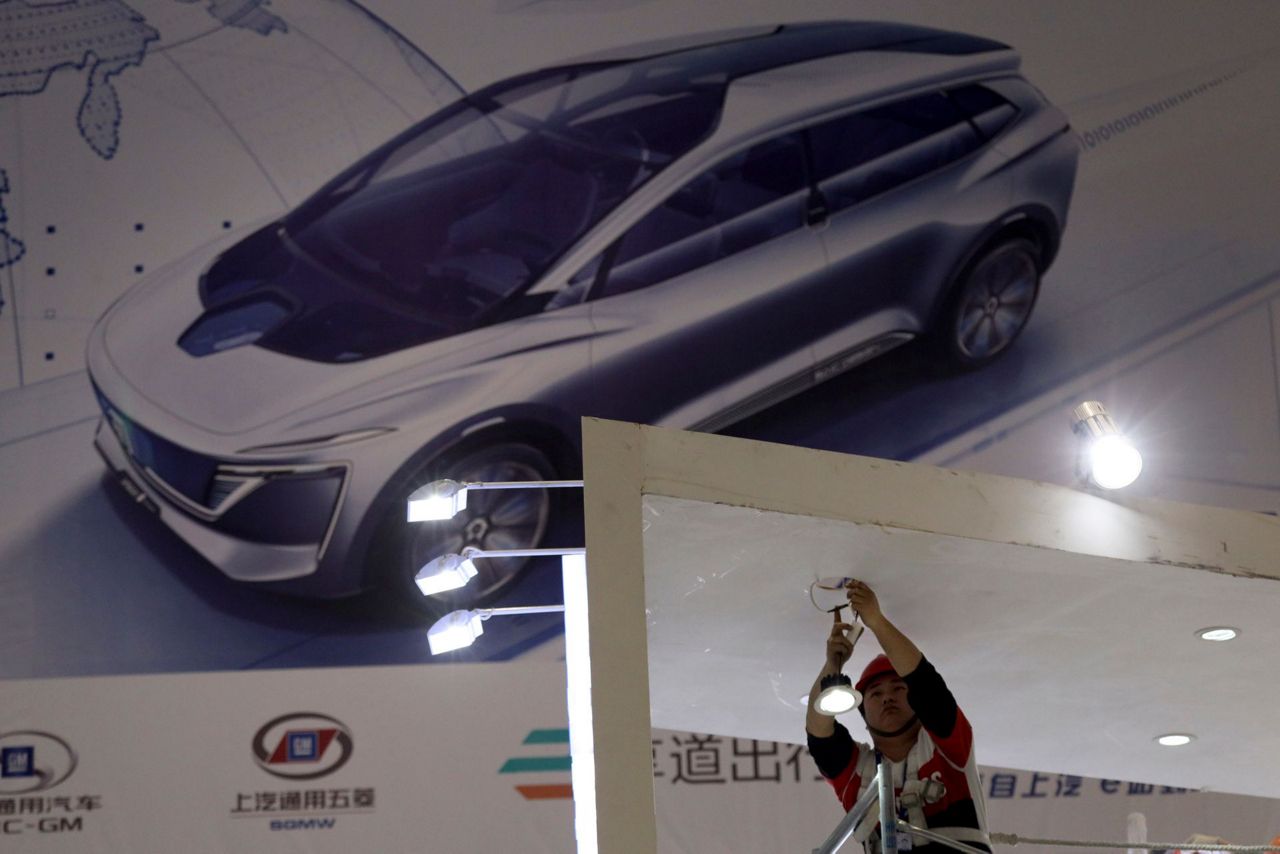 China's electric car sales slump, squeezing automakers