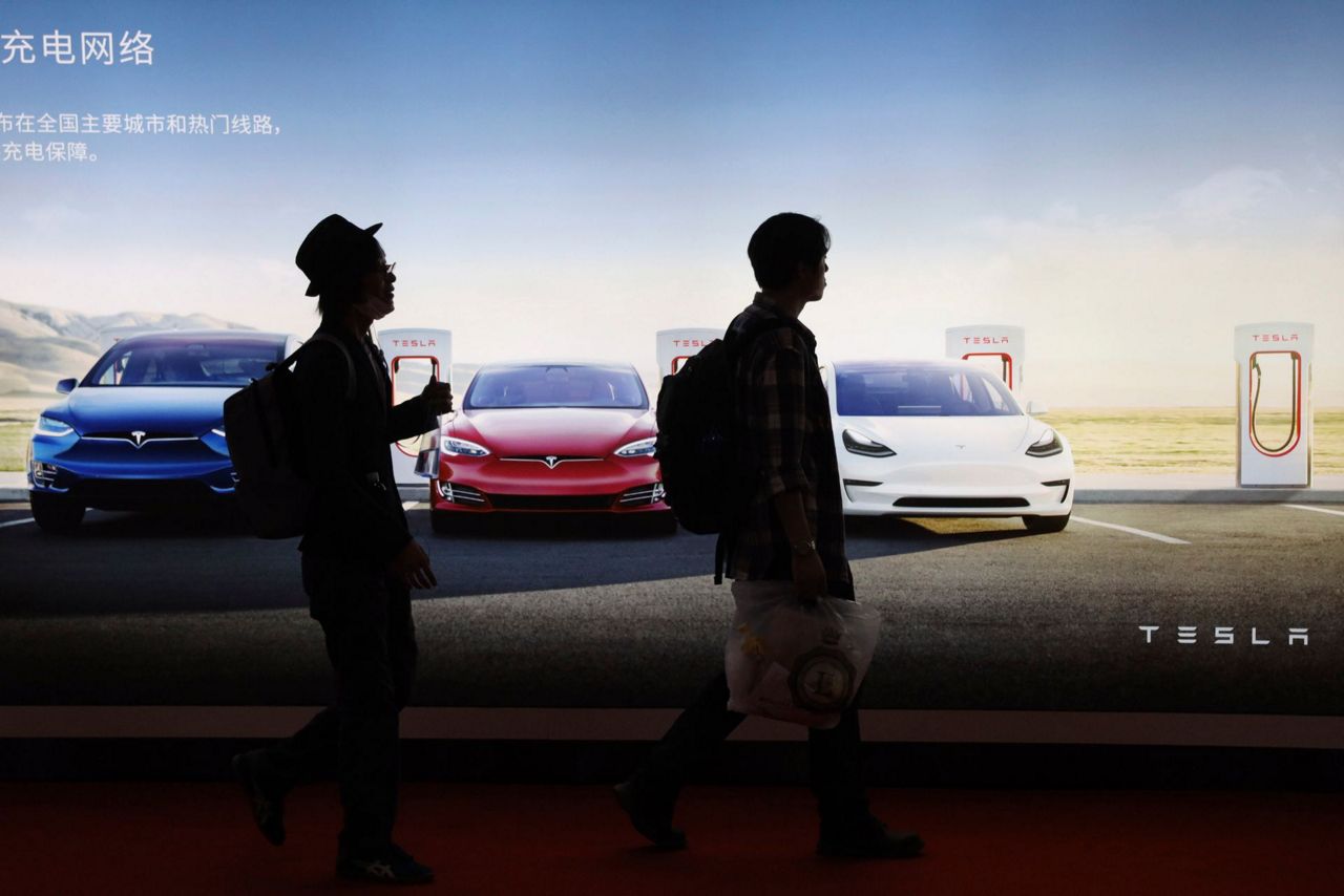 China's electric car sales slump, squeezing automakers