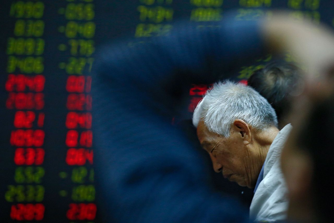Asian shares mixed on US partial shutdown, Wall Street slump