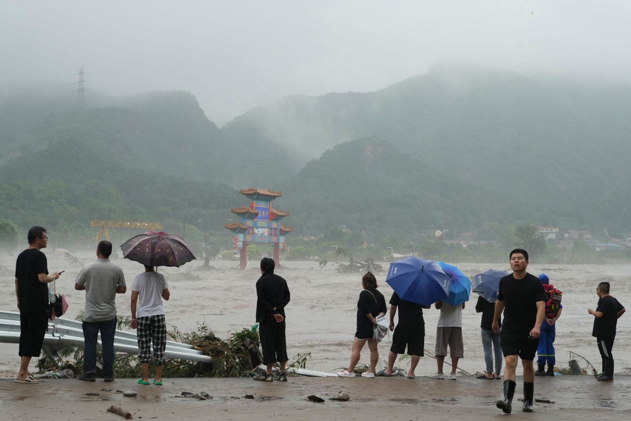 11 dead and 27 missing in flooding around Beijing after days of rain